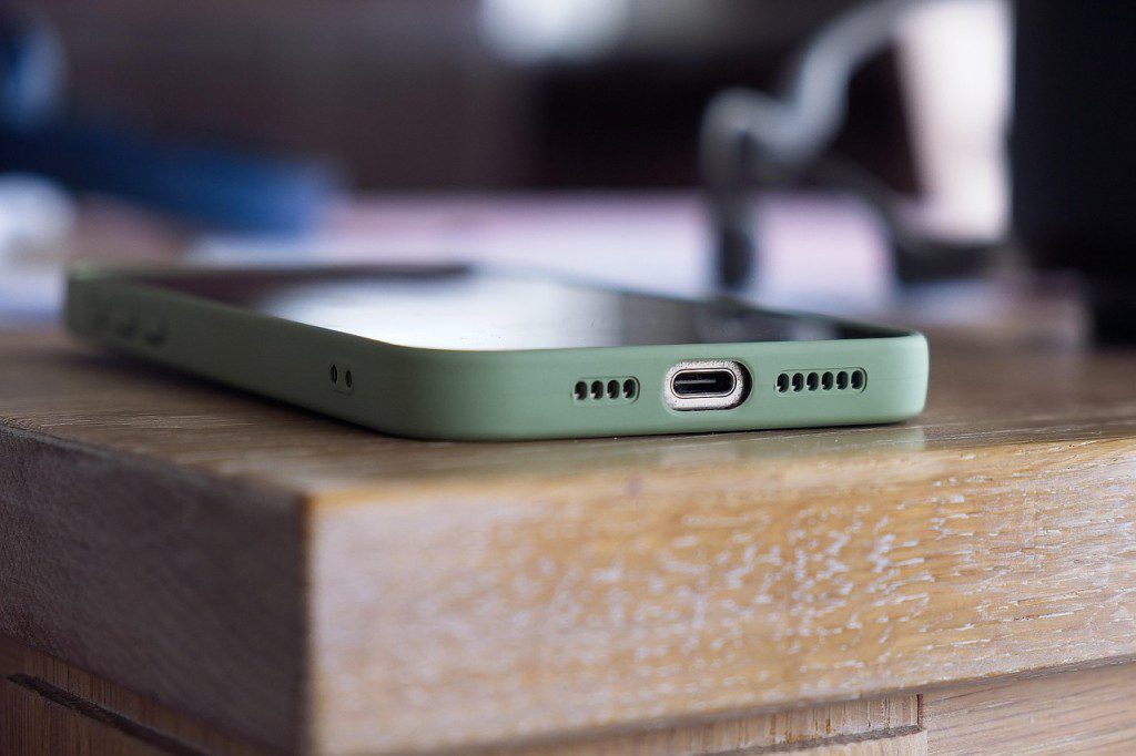 A mobile phone left on a kitchen worktop